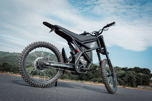 Black electric dirt bike on road