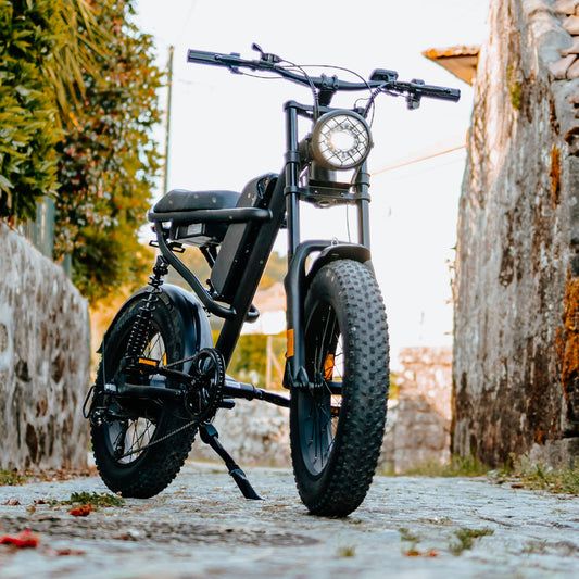 Black Z8 series ebikes urban tracker ebike parked against a vibrant city mural